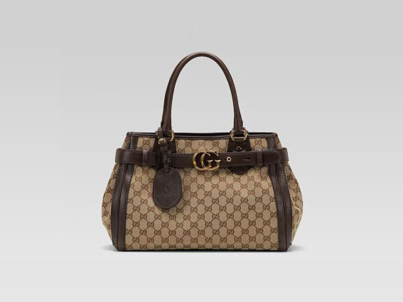 247183   ‘GUCCI running’中號購物袋，配以真皮包帶和 GG 轉動細節，配以棕色真皮滾邊，雙提手（長 15 厘米）